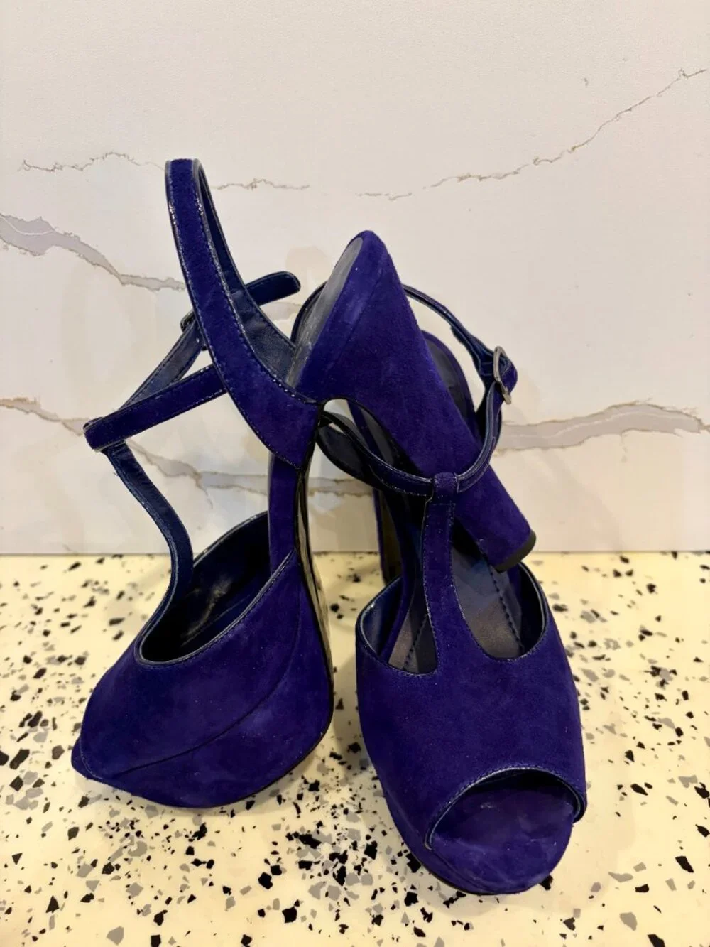 Suede Blue 7 1/2, excellent condition strap on shoe.